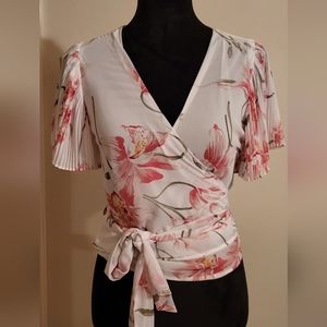 Floral pink white and green semi sheer wrap flowy sleeve wrap top. Size S.